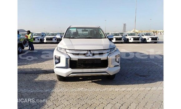 Buy Import Mitsubishi L200 White Car in Import - Dubai in Andijon Buy Import Mitsubishi L200 White Car in Import - Dubai in Andijon