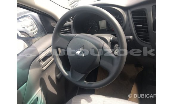 Buy Import Mitsubishi L200 White Car in Import - Dubai in Andijon