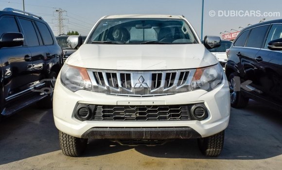 Buy Import Mitsubishi L200 White Car in Import - Dubai in Andijon Buy Import Mitsubishi L200 White Car in Import - Dubai in Andijon