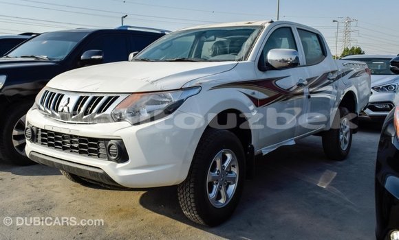 Buy Import Mitsubishi L200 White Car in Import - Dubai in Andijon Buy Import Mitsubishi L200 White Car in Import - Dubai in Andijon