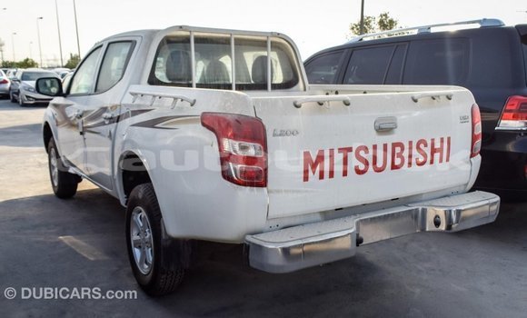 Buy Import Mitsubishi L200 White Car in Import - Dubai in Andijon Buy Import Mitsubishi L200 White Car in Import - Dubai in Andijon