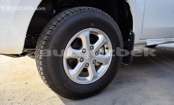 Buy Import Mitsubishi L200 White Car in Import - Dubai in Andijon Buy Import Mitsubishi L200 White Car in Import - Dubai in Andijon