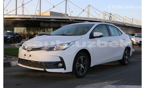 Buy Import Toyota Corolla White Car in Import - Dubai in Andijon Buy Import Toyota Corolla White Car in Import - Dubai in Andijon