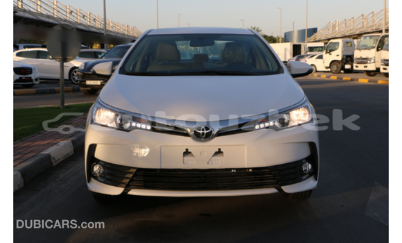 Buy Import Toyota Corolla White Car in Import - Dubai in Andijon Buy Import Toyota Corolla White Car in Import - Dubai in Andijon