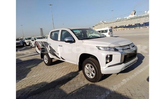 Buy Import Mitsubishi L200 White Car in Import - Dubai in Andijon Buy Import Mitsubishi L200 White Car in Import - Dubai in Andijon