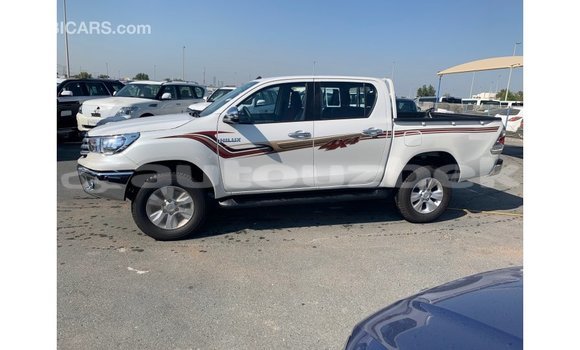 Buy Import Toyota Hilux White Car in Import - Dubai in Andijon Buy Import Toyota Hilux White Car in Import - Dubai in Andijon