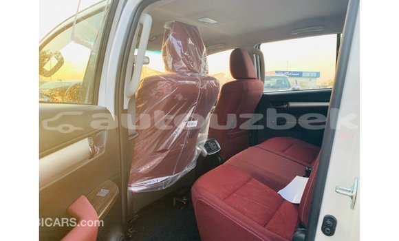 Buy Import Toyota Hilux White Car in Import - Dubai in Andijon Buy Import Toyota Hilux White Car in Import - Dubai in Andijon