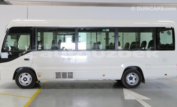 Buy Import Toyota Coaster White Car in Import - Dubai in Andijon Buy Import Toyota Coaster White Car in Import - Dubai in Andijon