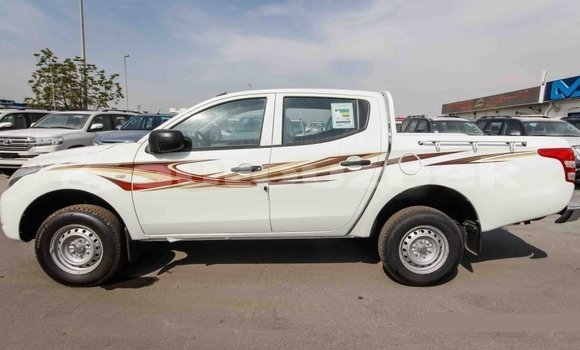 Buy Import Mitsubishi L200 White Car in Import - Dubai in Andijon Buy Import Mitsubishi L200 White Car in Import - Dubai in Andijon