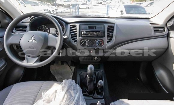 Buy Import Mitsubishi L200 White Car in Import - Dubai in Andijon Buy Import Mitsubishi L200 White Car in Import - Dubai in Andijon