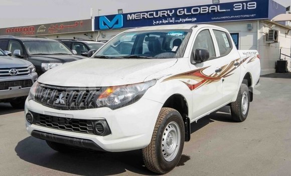 Buy Import Mitsubishi L200 White Car in Import - Dubai in Andijon Buy Import Mitsubishi L200 White Car in Import - Dubai in Andijon