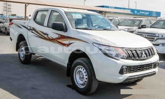 Buy Import Mitsubishi L200 White Car in Import - Dubai in Andijon Buy Import Mitsubishi L200 White Car in Import - Dubai in Andijon