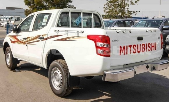 Buy Import Mitsubishi L200 White Car in Import - Dubai in Andijon Buy Import Mitsubishi L200 White Car in Import - Dubai in Andijon