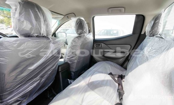 Buy Import Mitsubishi L200 White Car in Import - Dubai in Andijon Buy Import Mitsubishi L200 White Car in Import - Dubai in Andijon