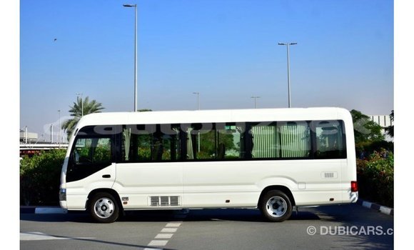 Buy Import Toyota Coaster White Car in Import - Dubai in Andijon Buy Import Toyota Coaster White Car in Import - Dubai in Andijon