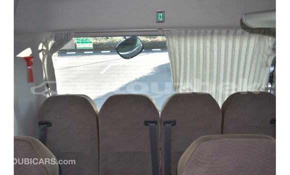 Buy Import Toyota Coaster White Car in Import - Dubai in Andijon Buy Import Toyota Coaster White Car in Import - Dubai in Andijon
