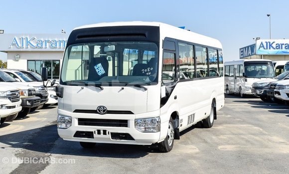 Buy Import Toyota Coaster White Car in Import - Dubai in Andijon Buy Import Toyota Coaster White Car in Import - Dubai in Andijon