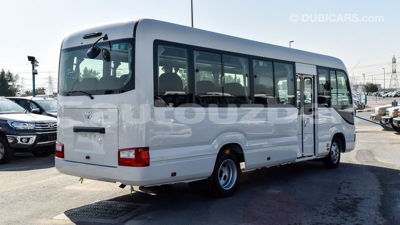 Big with watermark toyota coaster andijon import dubai 1982
