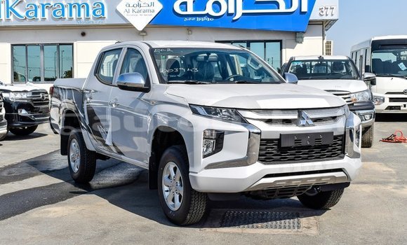 Buy Import Mitsubishi L200 White Car in Import - Dubai in Andijon Buy Import Mitsubishi L200 White Car in Import - Dubai in Andijon