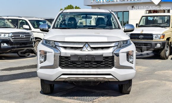 Buy Import Mitsubishi L200 White Car in Import - Dubai in Andijon Buy Import Mitsubishi L200 White Car in Import - Dubai in Andijon
