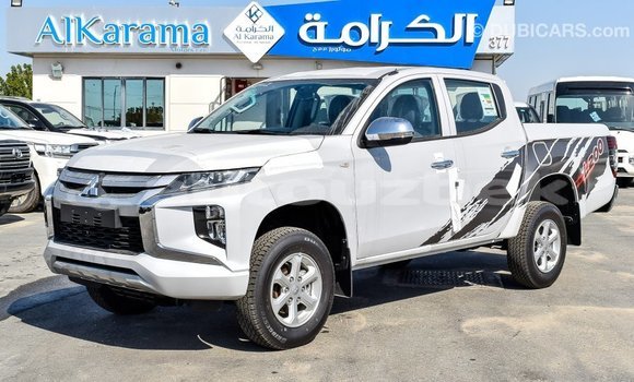 Buy Import Mitsubishi L200 White Car in Import - Dubai in Andijon Buy Import Mitsubishi L200 White Car in Import - Dubai in Andijon