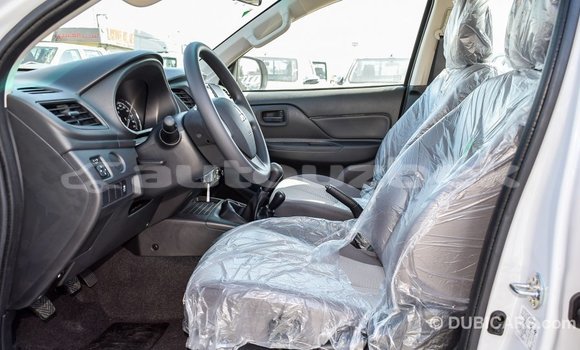 Buy Import Mitsubishi L200 White Car in Import - Dubai in Andijon Buy Import Mitsubishi L200 White Car in Import - Dubai in Andijon
