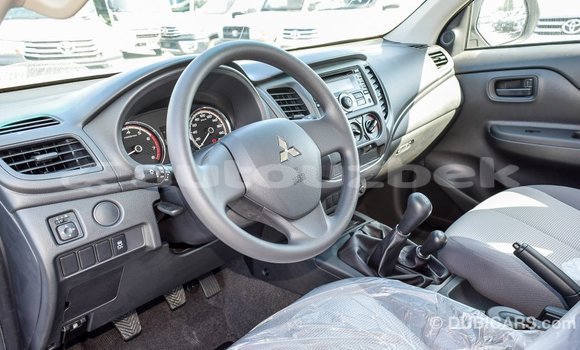 Buy Import Mitsubishi L200 White Car in Import - Dubai in Andijon Buy Import Mitsubishi L200 White Car in Import - Dubai in Andijon