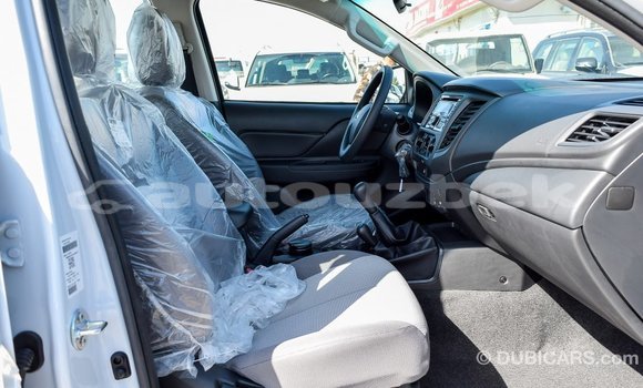 Buy Import Mitsubishi L200 White Car in Import - Dubai in Andijon Buy Import Mitsubishi L200 White Car in Import - Dubai in Andijon