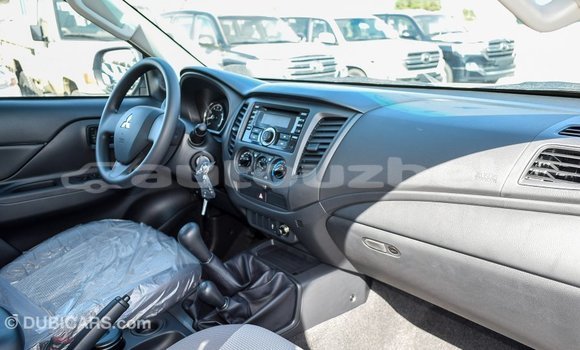 Buy Import Mitsubishi L200 White Car in Import - Dubai in Andijon Buy Import Mitsubishi L200 White Car in Import - Dubai in Andijon
