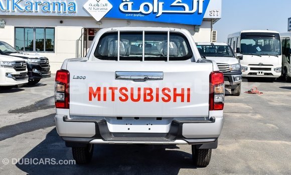 Buy Import Mitsubishi L200 White Car in Import - Dubai in Andijon Buy Import Mitsubishi L200 White Car in Import - Dubai in Andijon