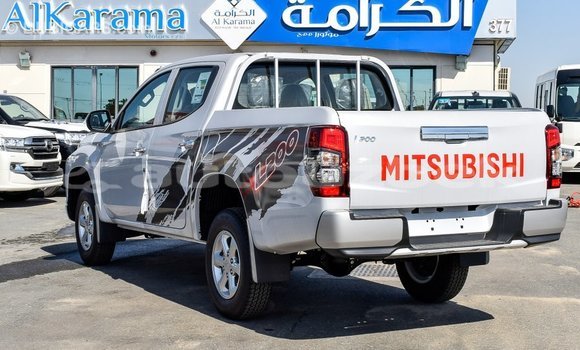 Buy Import Mitsubishi L200 White Car in Import - Dubai in Andijon Buy Import Mitsubishi L200 White Car in Import - Dubai in Andijon