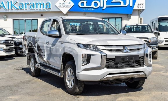 Buy Import Mitsubishi L200 White Car in Import - Dubai in Andijon Buy Import Mitsubishi L200 White Car in Import - Dubai in Andijon