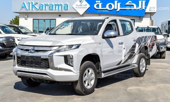 Buy Import Mitsubishi L200 White Car in Import - Dubai in Andijon Buy Import Mitsubishi L200 White Car in Import - Dubai in Andijon