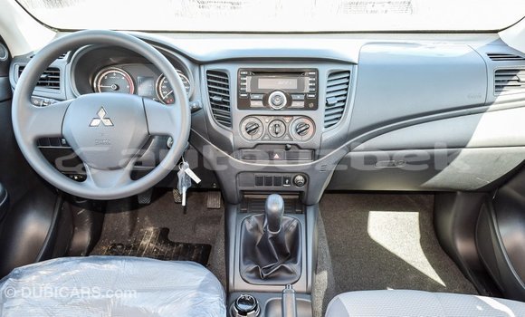 Buy Import Mitsubishi L200 White Car in Import - Dubai in Andijon Buy Import Mitsubishi L200 White Car in Import - Dubai in Andijon