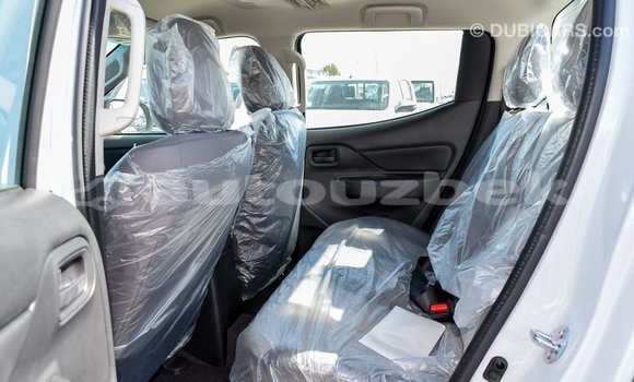 Buy Import Mitsubishi L200 White Car in Import - Dubai in Andijon Buy Import Mitsubishi L200 White Car in Import - Dubai in Andijon