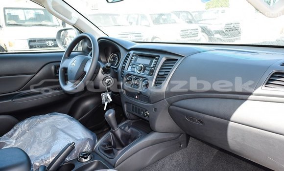 Buy Import Mitsubishi L200 White Car in Import - Dubai in Andijon Buy Import Mitsubishi L200 White Car in Import - Dubai in Andijon