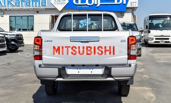 Buy Import Mitsubishi L200 White Car in Import - Dubai in Andijon Buy Import Mitsubishi L200 White Car in Import - Dubai in Andijon
