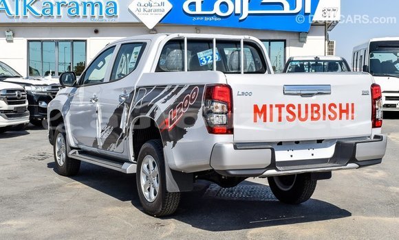 Buy Import Mitsubishi L200 White Car in Import - Dubai in Andijon Buy Import Mitsubishi L200 White Car in Import - Dubai in Andijon