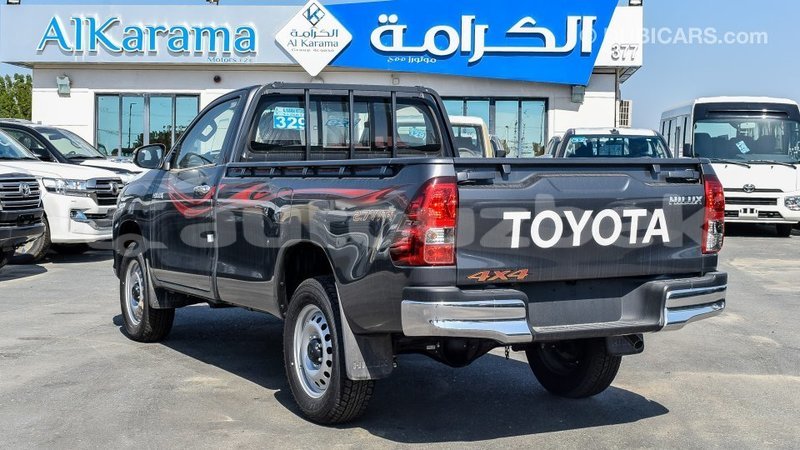 Big with watermark toyota hilux andijon import dubai 1990