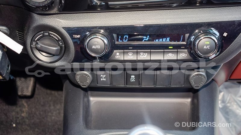 Big with watermark toyota hilux andijon import dubai 1991