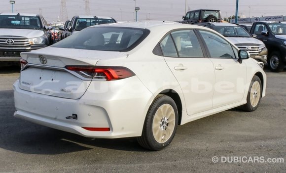 Buy Import Toyota Corolla White Car in Import - Dubai in Andijon Buy Import Toyota Corolla White Car in Import - Dubai in Andijon