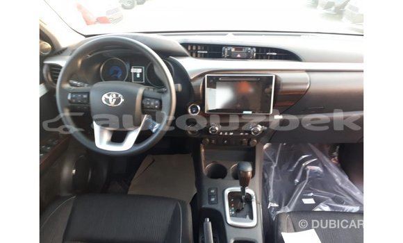 Buy Import Toyota Hilux Red Car in Import - Dubai in Andijon Buy Import Toyota Hilux Red Car in Import - Dubai in Andijon