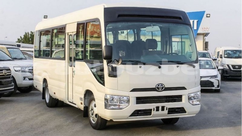 Big with watermark toyota coaster andijon import dubai 2196