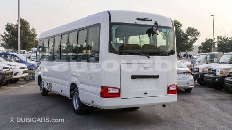 Big with watermark toyota coaster andijon import dubai 2196