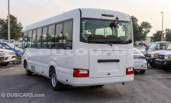 Buy Import Toyota Coaster White Car in Import - Dubai in Andijon Buy Import Toyota Coaster White Car in Import - Dubai in Andijon