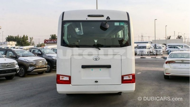 Big with watermark toyota coaster andijon import dubai 2196