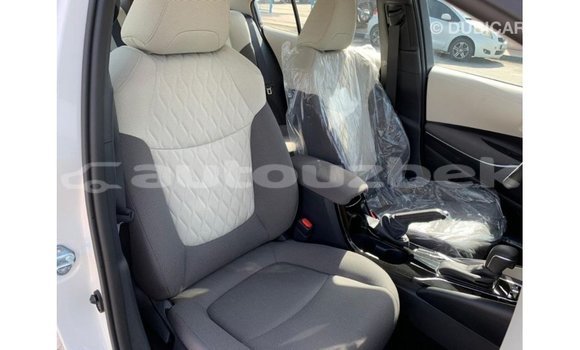 Buy Import Toyota Corolla White Car in Import - Dubai in Andijon Buy Import Toyota Corolla White Car in Import - Dubai in Andijon
