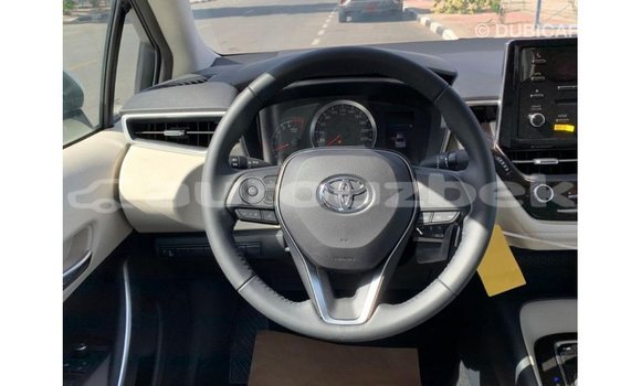 Buy Import Toyota Corolla White Car in Import - Dubai in Andijon Buy Import Toyota Corolla White Car in Import - Dubai in Andijon