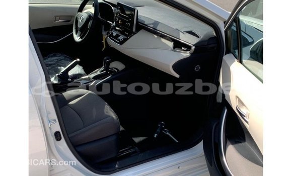 Buy Import Toyota Corolla White Car in Import - Dubai in Andijon Buy Import Toyota Corolla White Car in Import - Dubai in Andijon