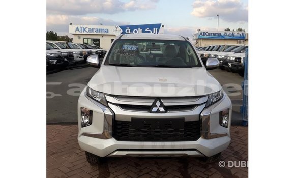 Buy Import Mitsubishi L200 White Car in Import - Dubai in Andijon Buy Import Mitsubishi L200 White Car in Import - Dubai in Andijon